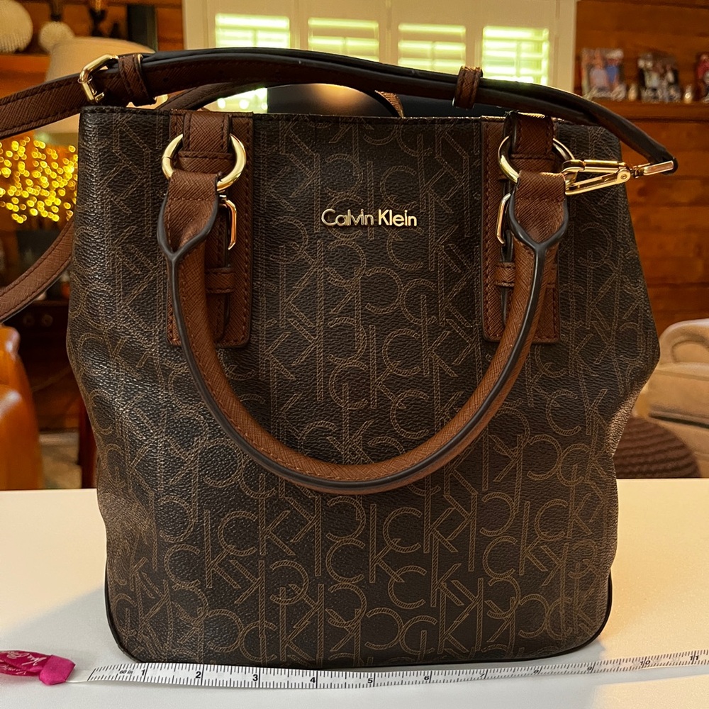 Calvin Klein Brown Monogram Tote with Gold Hardware 10” x 9” x 6”.